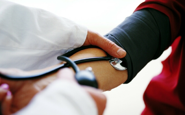 Doctor Checking the Blood Pressure of a Patient