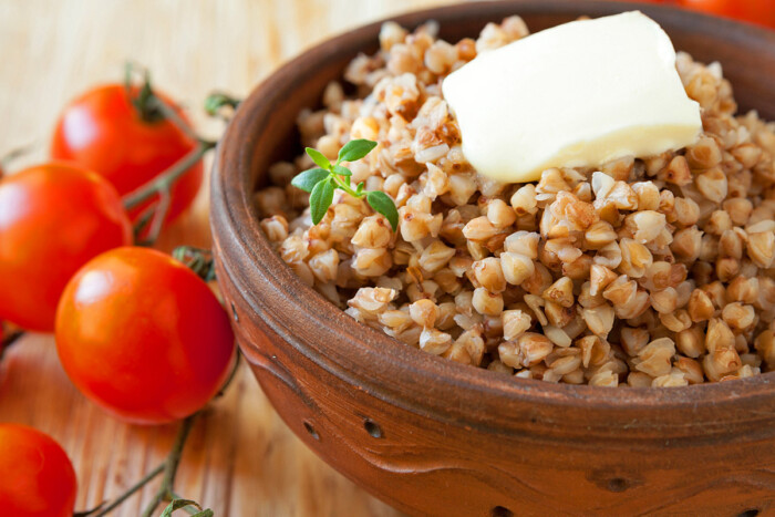 crumbly buckwheat porridge and fresh tomatoes