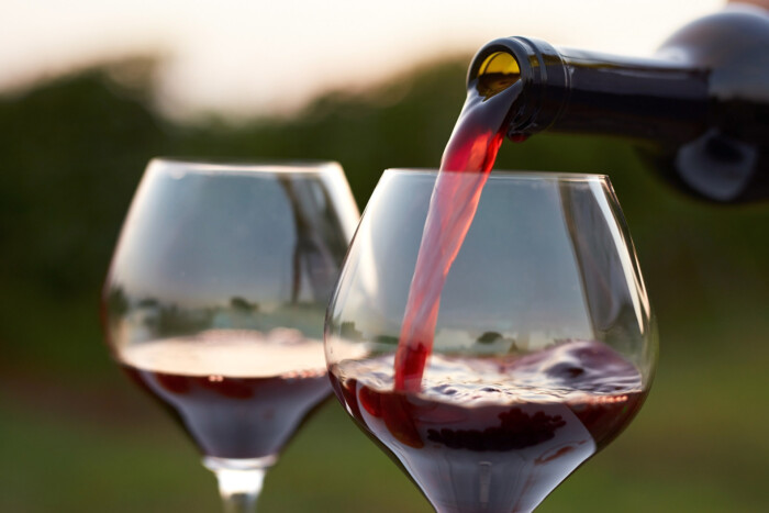 Pouring red wine